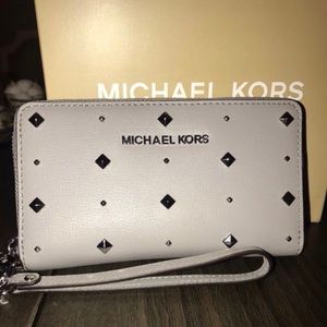 Gray “Jet Set Travel” Leather Wristlet